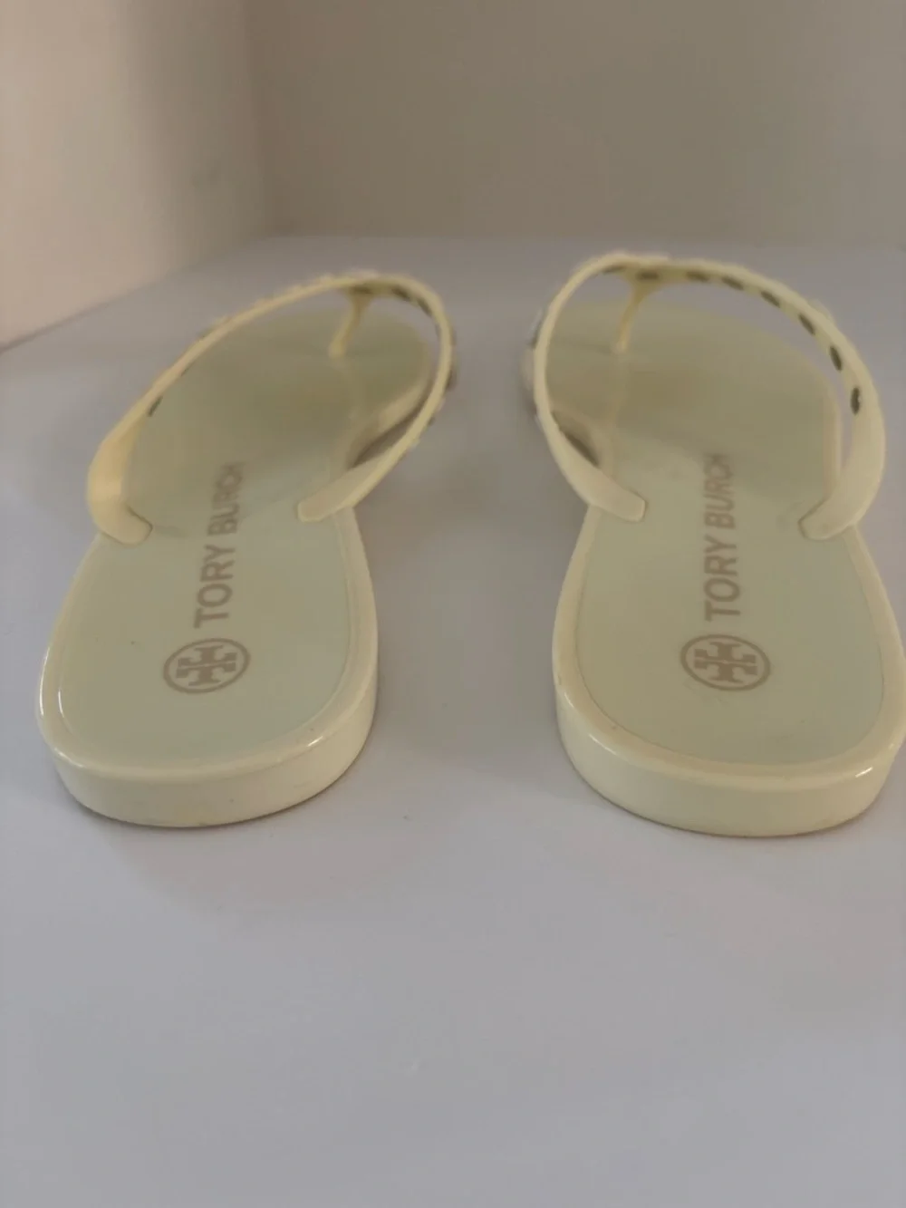 Tory Burch Ivory/pale yellow thong jelly  sandals size 7. Studded w/metal logos